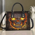 Black PU handbag with glowing orange skull print and golden metal rivet details - Glowing Skull Lava Eyes - Black Strap
