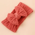 Pink cable knit nylon baby headband with a large decorative bow for infants - Brick Red