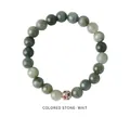 Close-up of green beaded bracelet with a silver-hued hollow charm and colorful gemstones - Light Green Colored Stone Style (WB335)