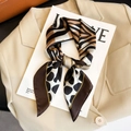 Elegant silk scarf featuring leopard and zebra prints in warm earth tones for women - 103 Square Scarves / 65