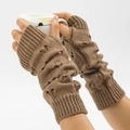 Brown chunky knit arm warmers with thumb holes and distressed hollow design in use - Khaki