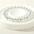 Elegant silver beaded stretch bracelet with high-polish metallic finish for women - 8mm / Silver