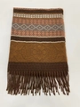 Close-up of ethnic striped scarf with orange geometric patterns and tassel details - Pink Coffee
