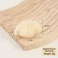 Realistic white PVC dumpling food model ornament on wooden textured display board - White Original Dumpling - No Clip