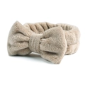 Gedetailleerd beeld van beige koraalvlies hoofdband met zachte pluche striktextuur - Khaki