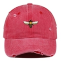 Detail of bee embroidery and distressed holes on washed rose red cotton baseball cap - One Size / Watermelon red