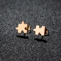 Polished puzzle piece stud earrings in gold finish made of premium stainless steel - Jigsaw Puzzle / Rose Gold