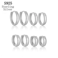Macro shot of four pairs of S925 sterling silver hoop earrings with micro-pave zircons - 925 Silver / Inner Diameter 6mm / Silver