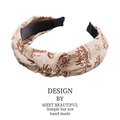 Beigefarbener Weihnachts-Haarreif mit Merry Christmas Aufdruck und festlichen Mustern - Khaki mit Beschriftung
