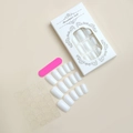 Macro detail of glossy white square press-on nail kit with pink file and adhesive tabs - Glossy Pure White Square Style (XA-51-51)