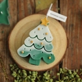 Handmade green and white gradient Christmas tree candle with a gold star on top - Mixed Color Christmas Tree