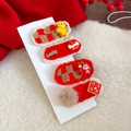 Détail de 4 barrettes à cheveux rouges du Nouvel An avec breloques Lucky et pompons - Richesse Coulante