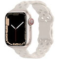 Correa de silicona calada para Apple Watch en color blanco crema con hebilla de oro rosa - Luz Estelar
