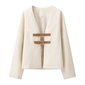 Veste courte beige pour femme sans col avec boucles en cuir marron sur fond blanc - XS / Blanc