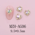 Macro shot of 9.5mm heart crystal nail art charm with gold base and aurora rhinestone - Pink Green Style(AG06)