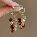 Detail of gold hoop earrings with tiger-eye brown beads and frosted metallic spheres - 13# Silver Earring Post - Gold Coffee