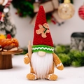 Weihnachtswichtel-Puppe mit roter Strickmütze und Nudelholz für festliche Deko - Herrenmodell mit Nudelholz / Rot