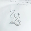 Macro shot of mirror silver acrylic 2026 cupcake topper with elegant text background - 2026 Silver Style 4 / 1.3mm / Silver