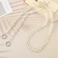 Crossbody iridescent beaded phone lanyard with silver metal rings on a soft beige background - AB Color