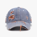 Distressed light blue washed denim baseball cap with vintage ripped details and orange lining - Medium Blue Denim with Orange Stitching