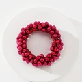Deep red handmade beaded scrunchie with pearl-like luster on white pedestal - Dark Red
