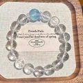 Artistic beaded bracelet featuring clear quartz and a central light blue natural stone bead - Aquamarine Natural Stone & White Glass Bracelet