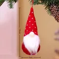 Christmas gnome ornament with red knitted hat and white beard hanging on a pine tree - Style H
