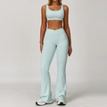 Two-piece light blue fitness yoga set featuring cross-back sports bra and V-waist flare pants - S / Top And Bottom / Bra + Flare Pants / Cream Green