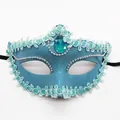 Sky blue masquerade mask with teal teardrop gemstone and silver beaded chain details - Blue