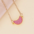 Golden moon necklace with pink glitter inlay on an elegant beige silk background - Pink