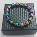 Iridescent geometric bead bracelet with colorful plating on black jewelry box - Rainbow Cube Beads Bracelet