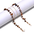 Detail of tiger eye stone chain with gold metal links and silicone loops for glasses - Gold