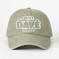 Front view of washed canvas baseball cap with white printed typography and curved brim - Khaki
