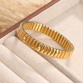 Pulsera elástica de acero inoxidable dorado con eslabones y piedras de circonita - Estilo de 12mm con Diamante / Dorado