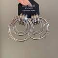Detail of S925 sterling silver multi-layered nested hoop earrings with ribbed texture - Multi-layer Round Rings (925 Sterling Silver Earring Post) / Silver
