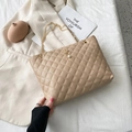 Beige quilted tote bag with golden chain strap and pearl crown charm detail - Apricot