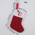 Red knit Christmas stocking with embroidered letter U and Santa hat, 20cm height - Letter U Style