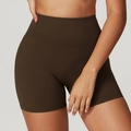 High-waisted compression yoga shorts in deep chocolate brown with body contouring fit - Coffee