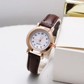 Minimalist women's quartz watch with brown leather strap and rose gold case on display - Gold Case Arabic Numerals White Dial Coffee Strap