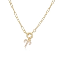 Detail of gold paperclip chain necklace with a pearl-inlaid Aries zodiac pendant - Aries / Gold