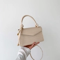 Minimalist beige textured crossbody bag with unique wave pattern and knot handle - Beige