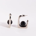 Minimalist silver geometric U-shaped earrings featuring polished black onyx spheres - White Gold