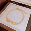 Adjustable golden bracelet with two detailed rose charms and zircon accents on wood box - 43# Bracelet-Gold-Double Rose 3D Style