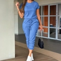 Women's blue short sleeve utility jumpsuit with drawstring waist and cargo pockets - S / Blue