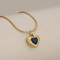Elegant gold snake chain necklace with a deep blue heart-shaped crystal pendant - Gold + Blue Zirconia