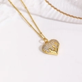 Detailed view of an 18k gold plated heart pendant necklace with shimmering crystals - Liquid Metal Zircon Heart Necklace / Gold