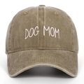 Close-up of white DOG MOM embroidery on a washed khaki distressed cotton baseball cap - One Size / Khaki