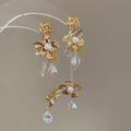 Detail of gold flower earrings featuring pearls and faceted teardrop pendants - 24# Gold - Rose Flower Single Pearl (Silver Earring Post)
