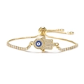 Goldenes Hamsa-Hand-Armband mit bösem Blick, Zirkonia und verstellbarer Zugkette - Goldene Hand der Fatima