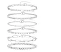 Set of 6 silver layered bracelets featuring Cuban links, Figaro chain, and rhinestone accents - Silver Set - Multiple Fashion Chains